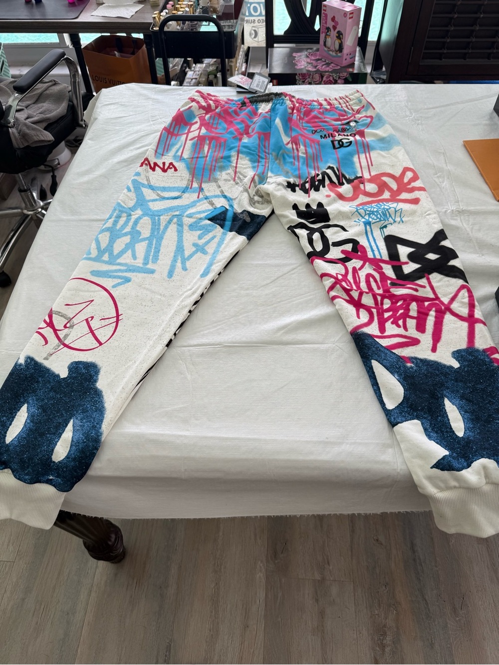 Dolce & Gabbana White Graffiti-Print Joggers with Blue and Pink Accents
